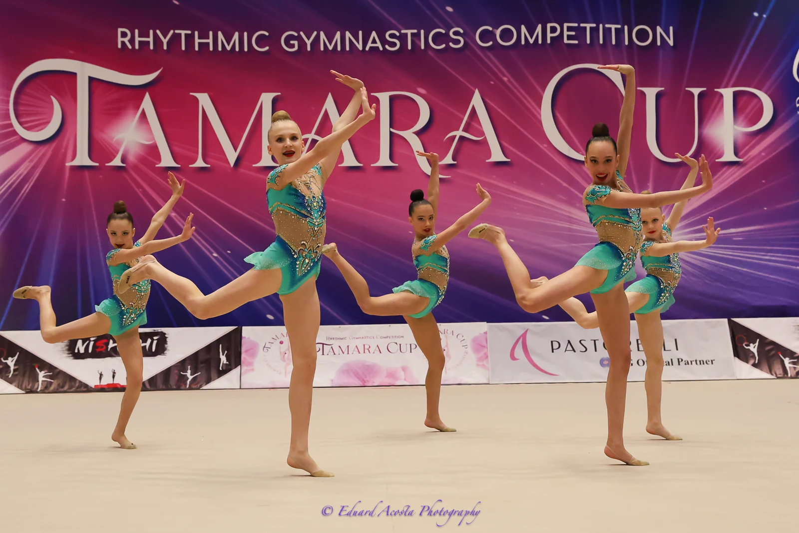 Gymnasts performing with hoops at the Tamara Cup